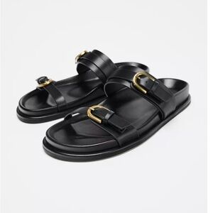 Black Sandals with Gold Buckles